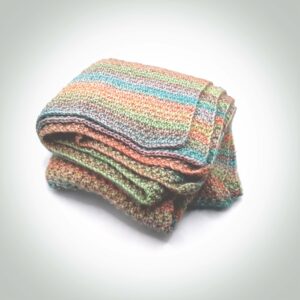 Rainbow-colored knit baby blanket