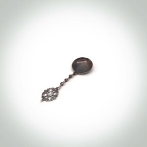 Silver measuring spoon